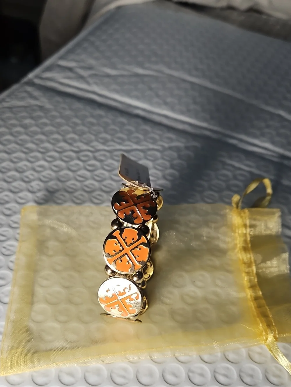 Tory Burch Gold-Tone Bracelet with Coral Orange Enamel Clover Motifs
